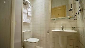 Standard Double Room | Bathroom | Shower, free toiletries, hair dryer, slippers