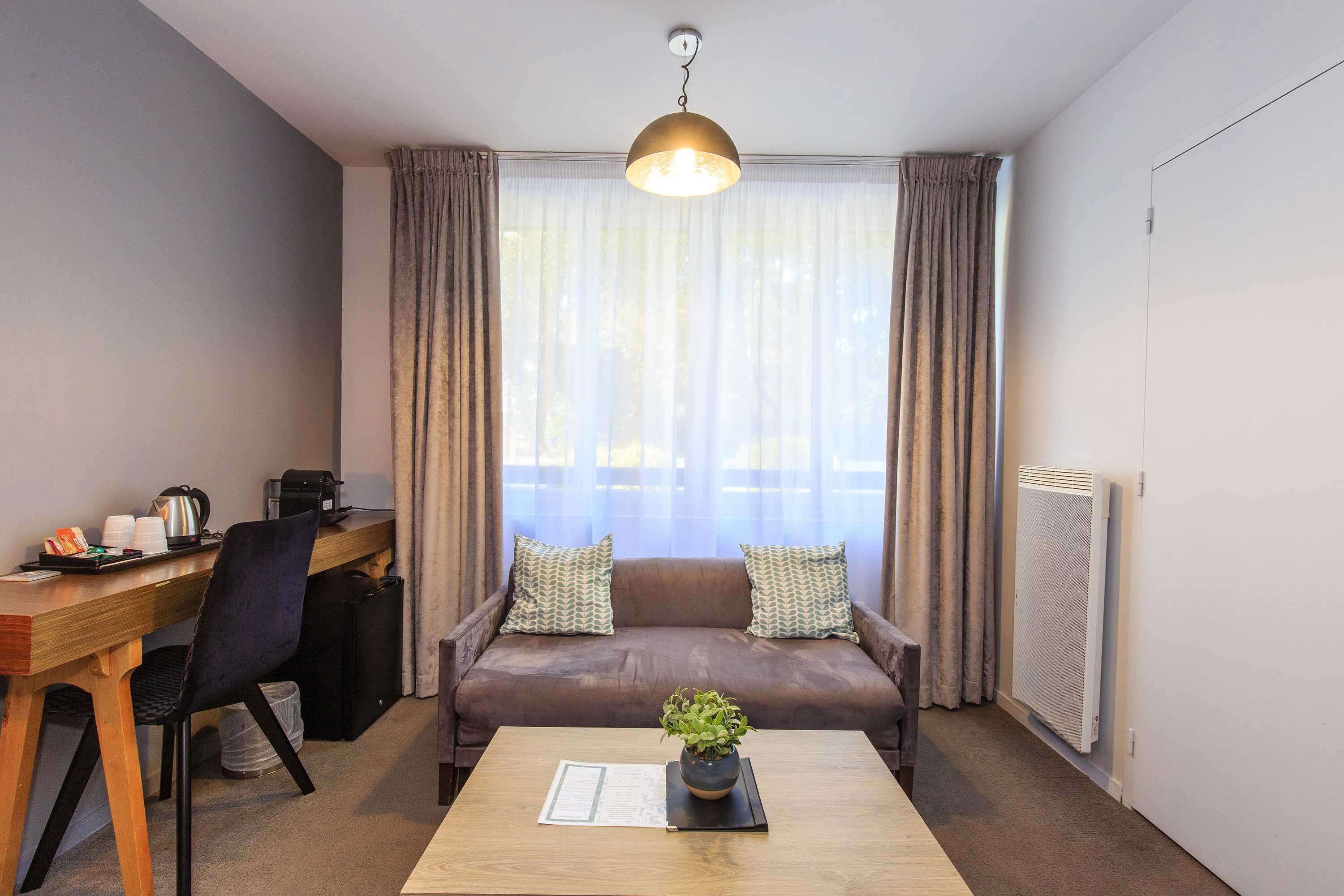 family room, 1 queen bed, non smoking (with sofabed) | in-room safe, desk, blackout curtains, soundproofing