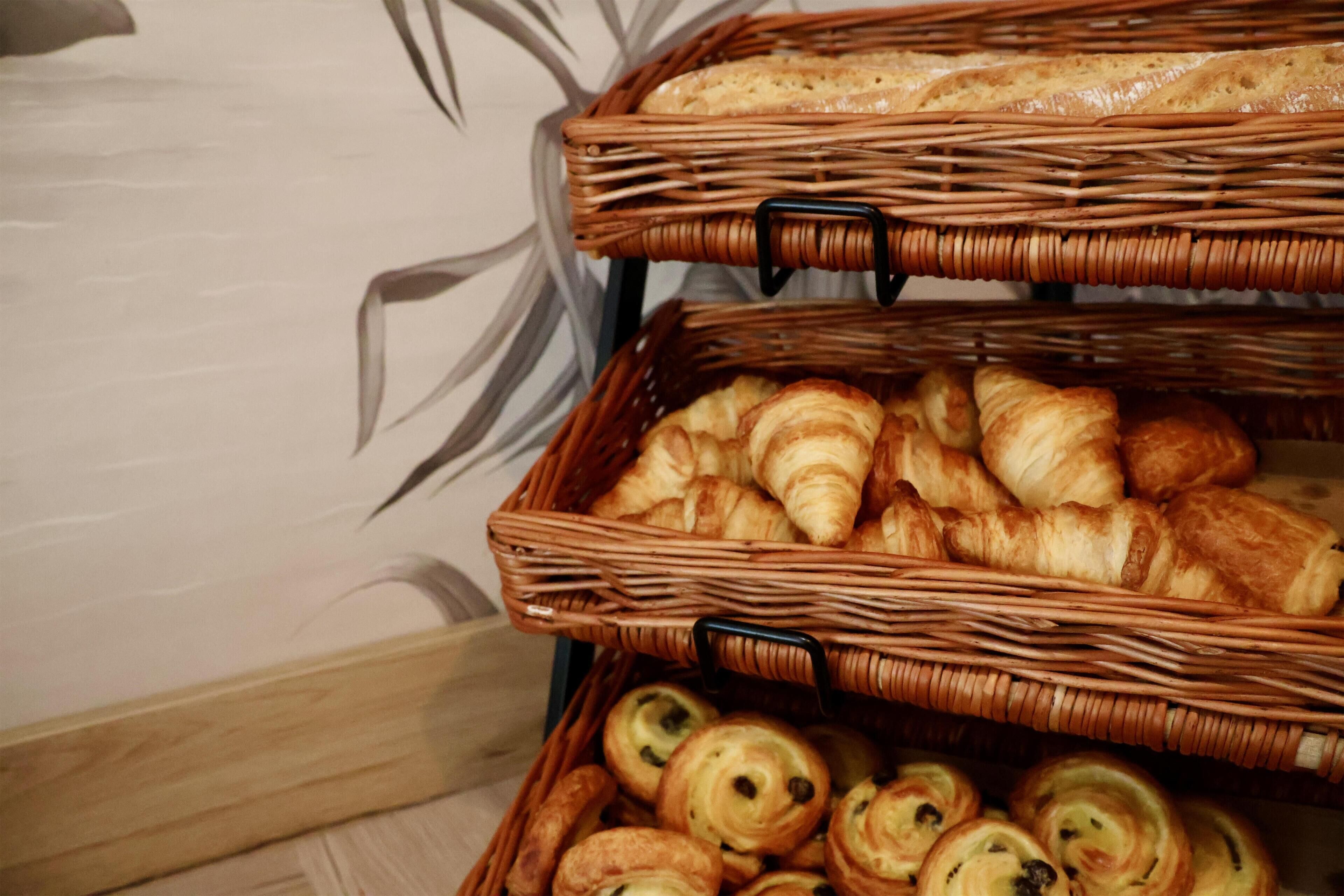 Wicker baskets filled with pastries.