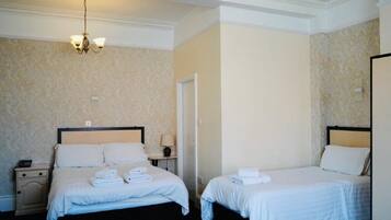 Family Room | Hypo-allergenic bedding, desk, laptop workspace, soundproofing