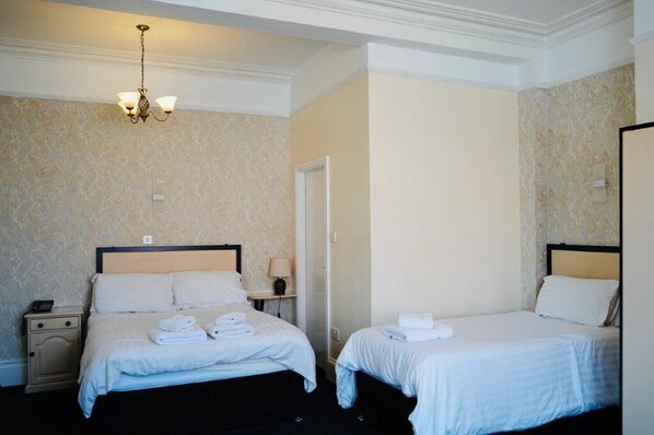 Family Room | Hypo-allergenic bedding, desk, laptop workspace, soundproofing