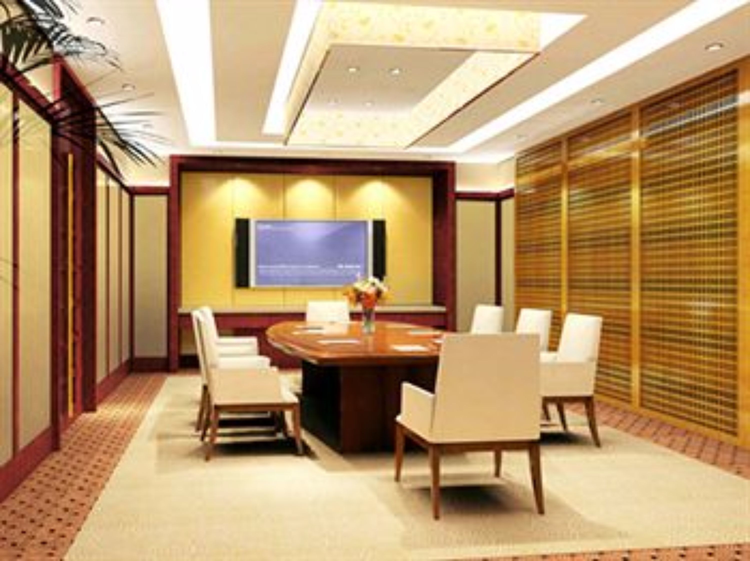 A conference room with a large table, chairs, a TV screen, and a wooden partition.