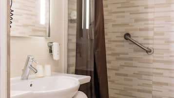 Shower, free toiletries, hair dryer, towels