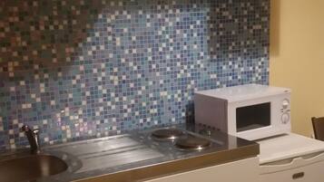 Apartment, 1 Bedroom | Private kitchen | Full-sized fridge, microwave, stovetop, electric kettle