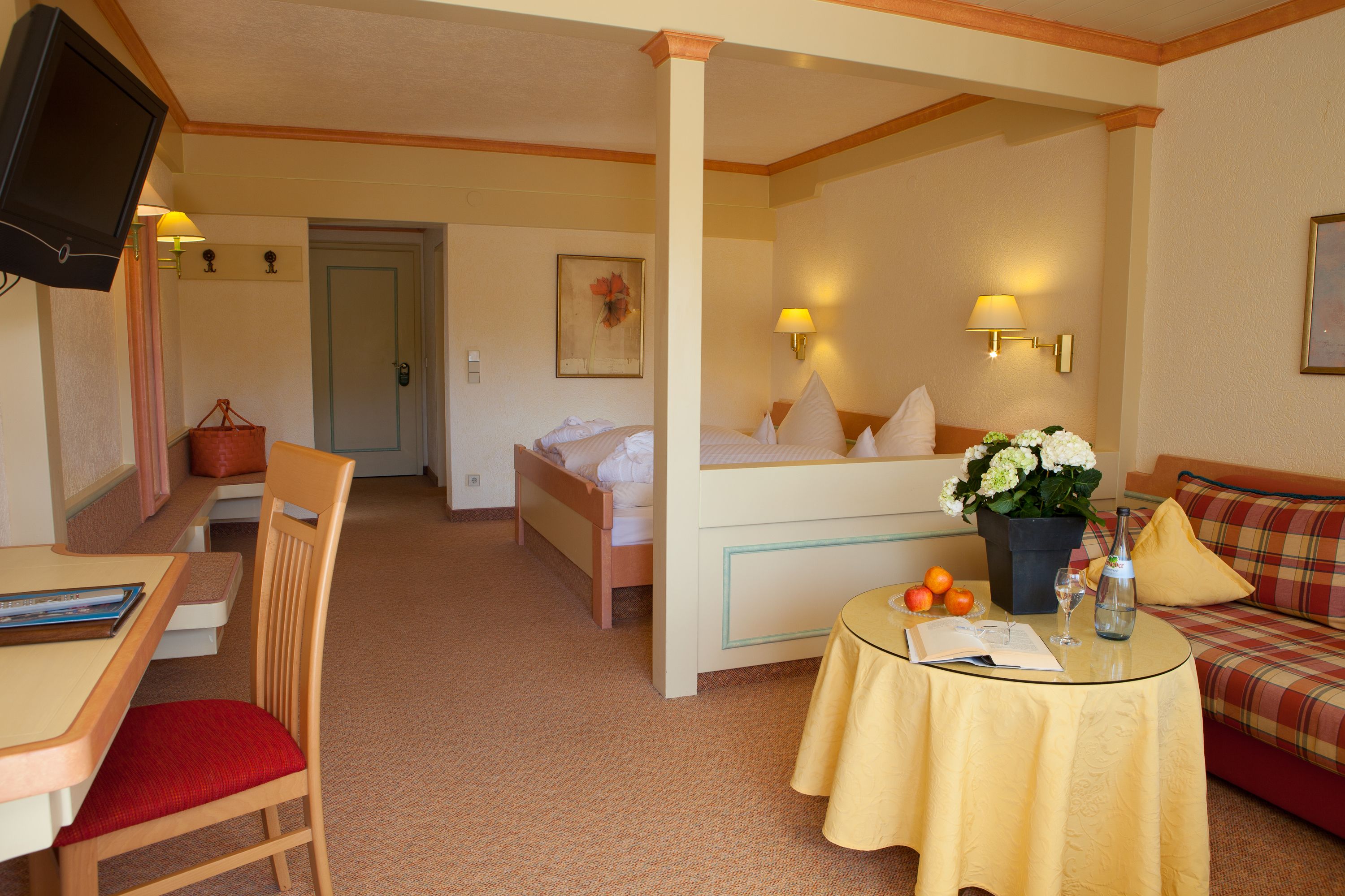 hypo-allergenic bedding, down duvets, in-room safe