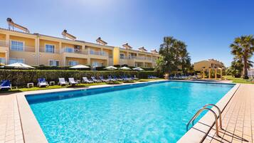 Seasonal outdoor pool, pool umbrellas