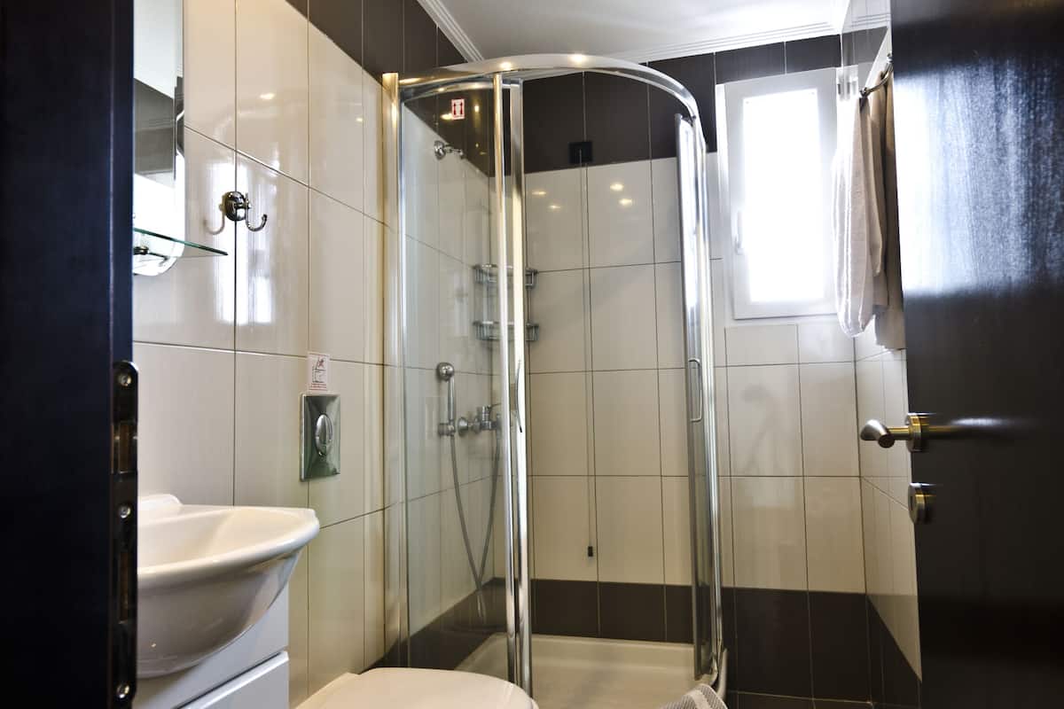 shower, free toiletries, hair dryer, dressing gowns