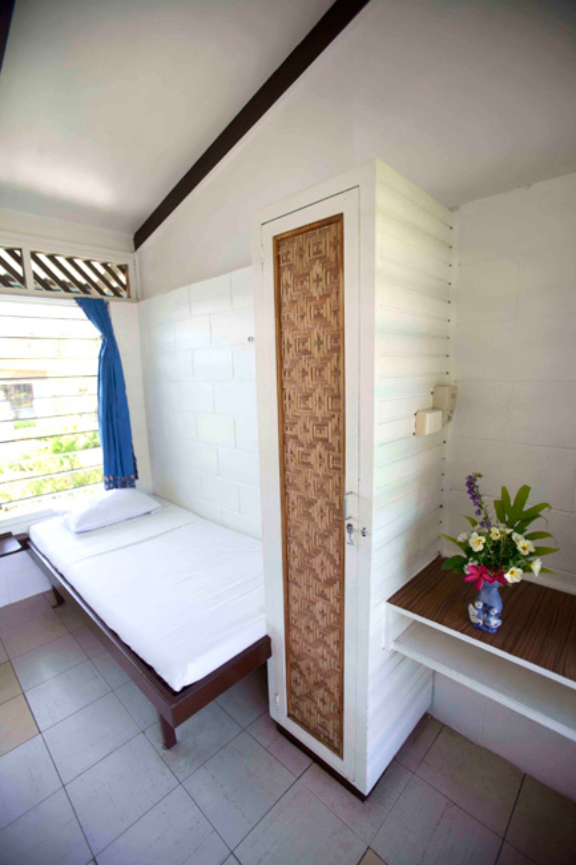 economy room, 2 single beds, courtyard area | in-room safe, individually furnished, laptop workspace