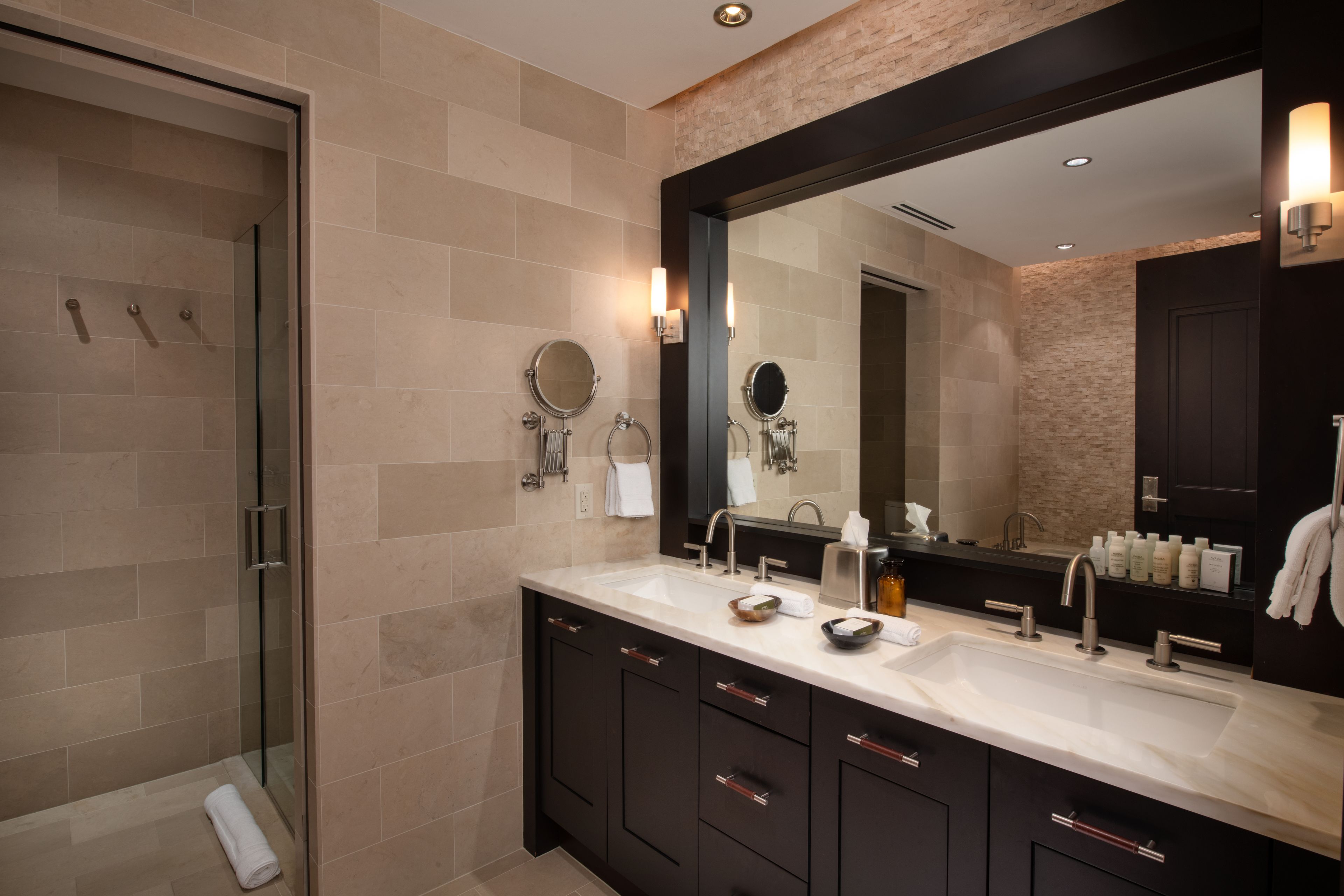 premium four bedroom plus den residence | bathroom | shower, rainfall showerhead, designer toiletries, hair dryer