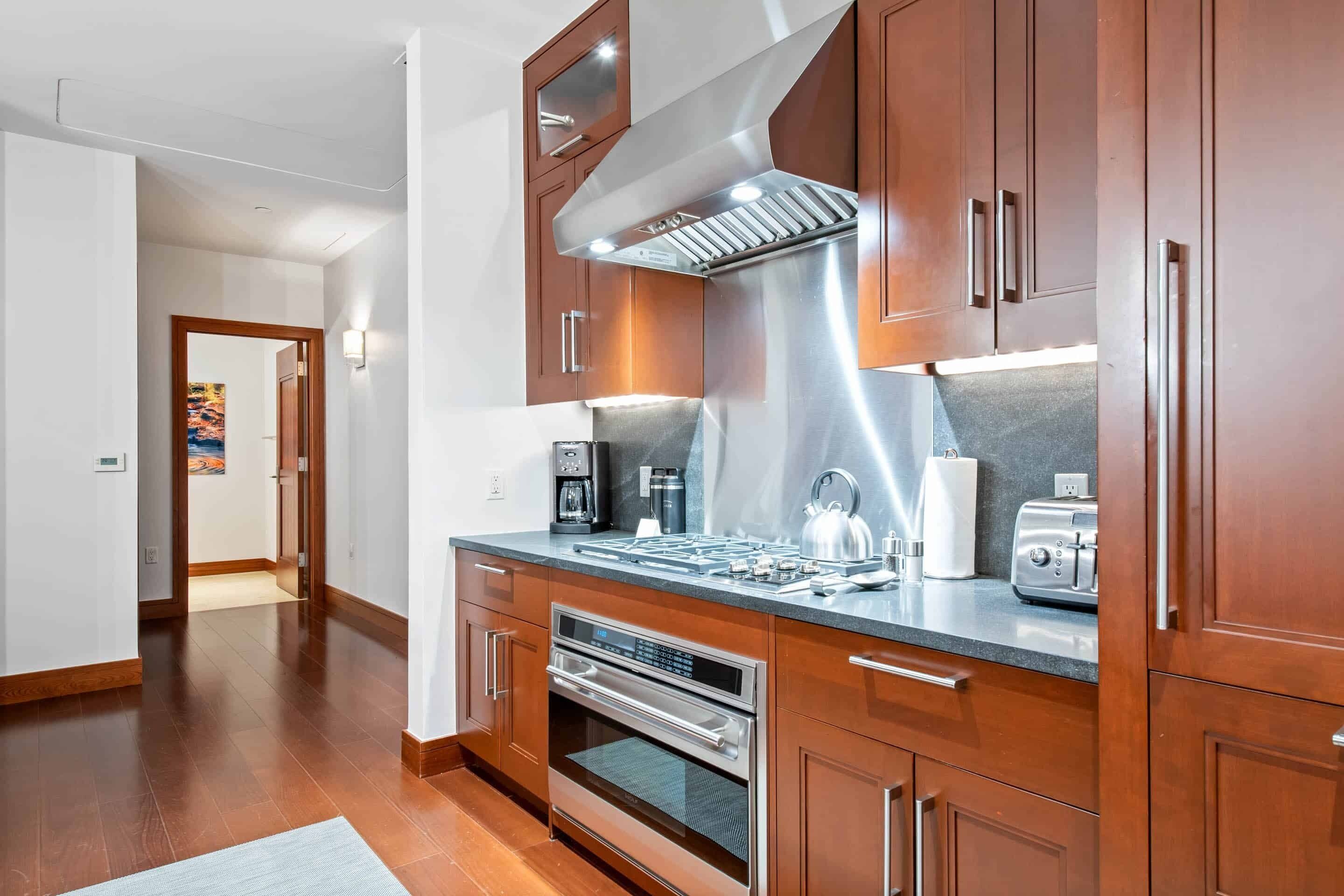 condo, multiple beds | private kitchen | full-sized fridge, microwave, oven, stovetop