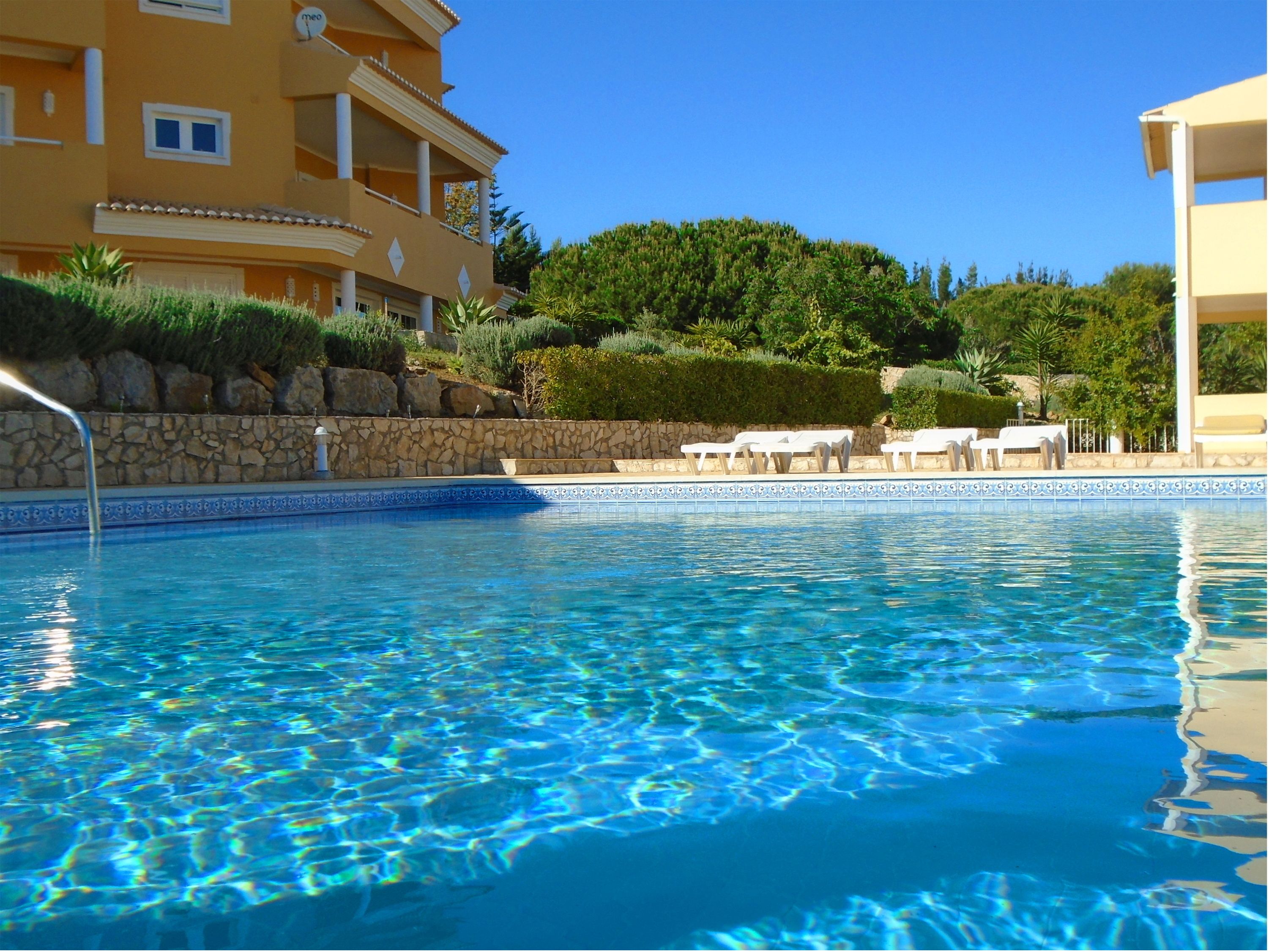 outdoor pool, pool loungers