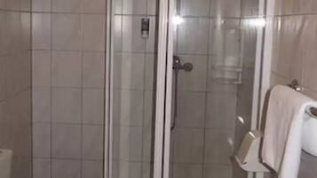 Shower, rainfall showerhead, towels