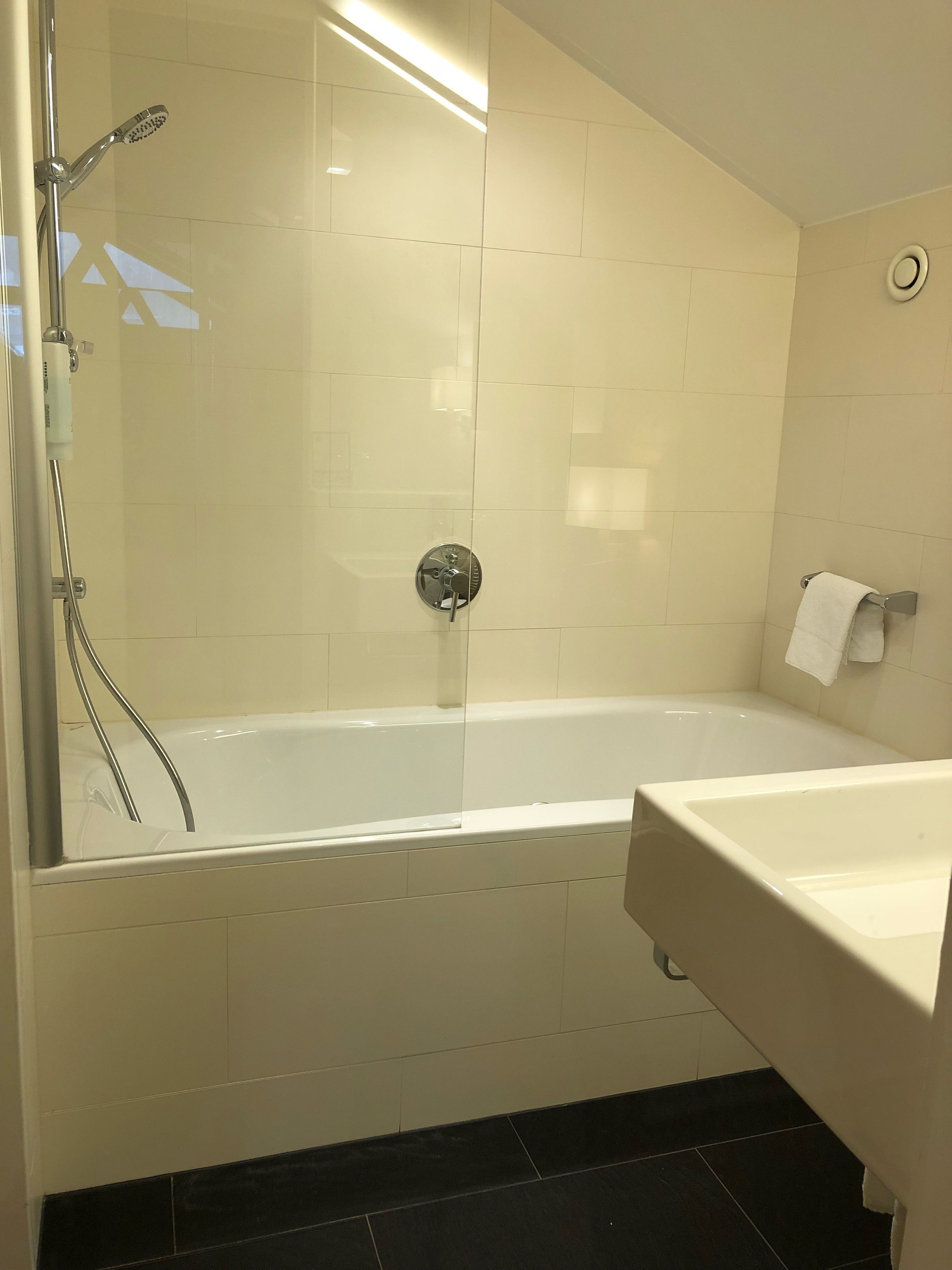 deluxe double room | bathroom | hair dryer, towels