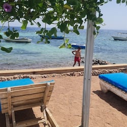 Private beach, white sand, beach umbrellas