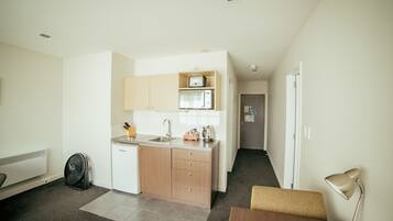 One Bedroom Suite with Spa Bath | Private kitchen | Microwave, stovetop, coffee/tea maker, electric kettle