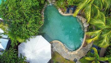 Outdoor pool, pool umbrellas, sun loungers
