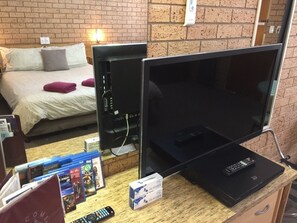 Suite Deluxe, 1 grand lit | Bureau, rideaux d’obscurcissement, système d’insonorisation
