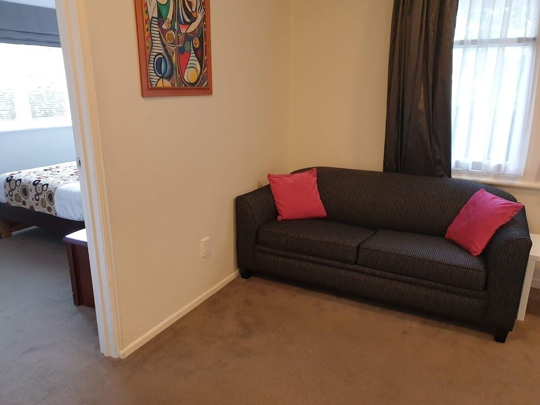 Room, 1 Bedroom | Desk, blackout drapes, iron/ironing board, free WiFi