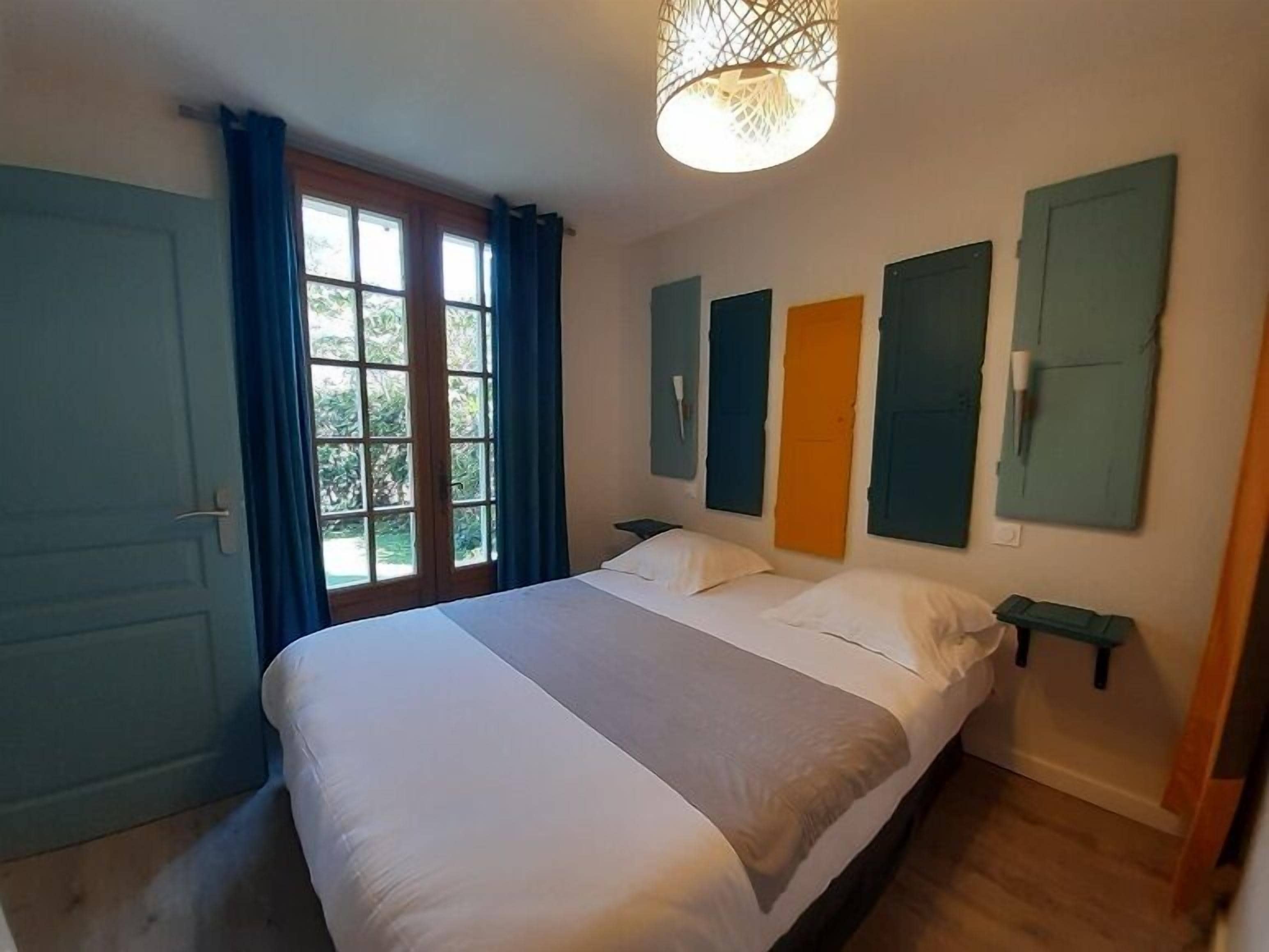 Family Room | Premium bedding, individually decorated, desk, blackout drapes