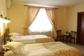 Premium bedding, down comforters, pillowtop beds, minibar