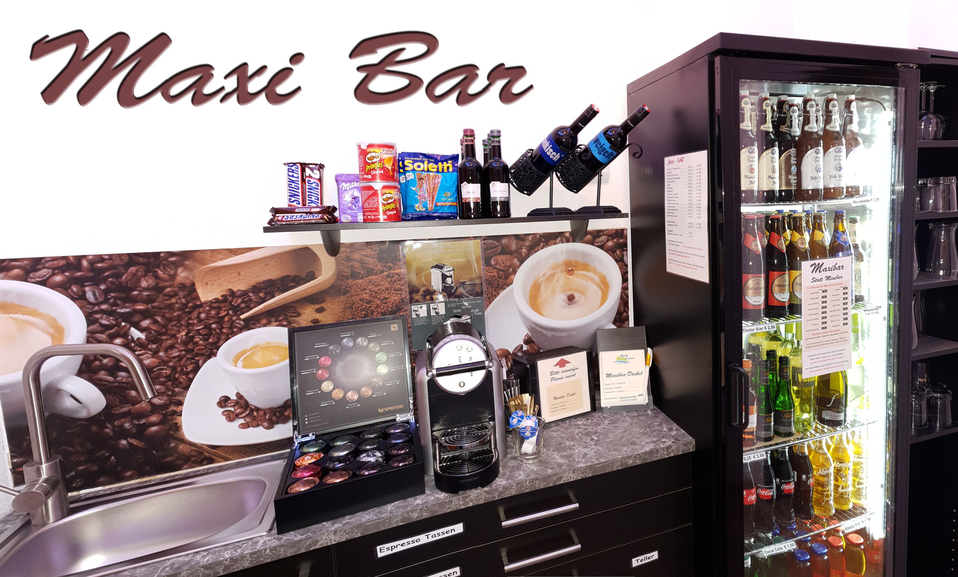 A bar area with a coffee machine, espresso options, and a selection of alcoholic beverages.