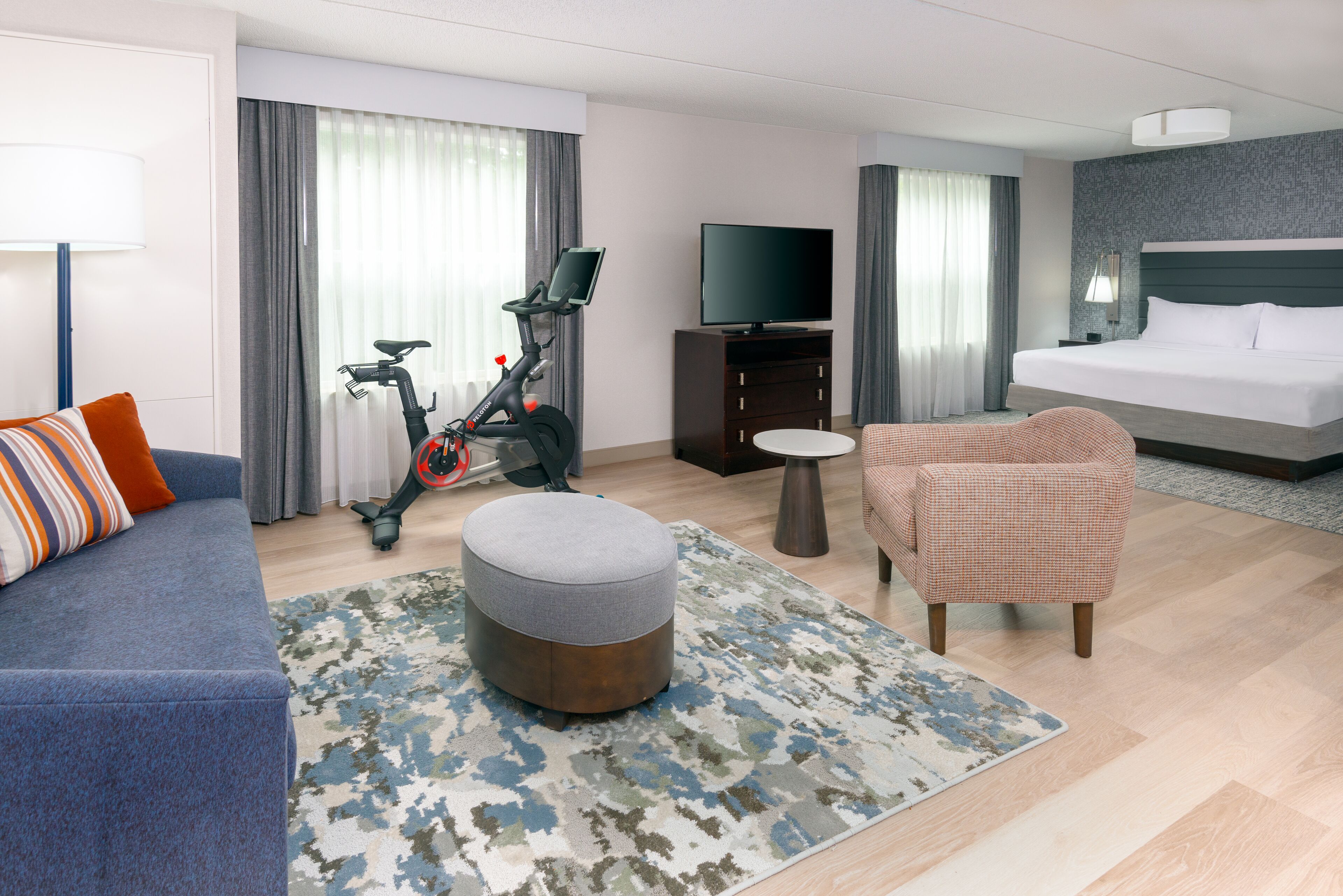 room, 1 king bed (in-room peloton bike) | in-room safe, desk, free cots/infant beds, free wifi