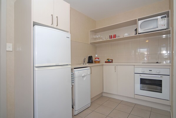 Mini-fridge, microwave, coffee/tea maker, electric kettle