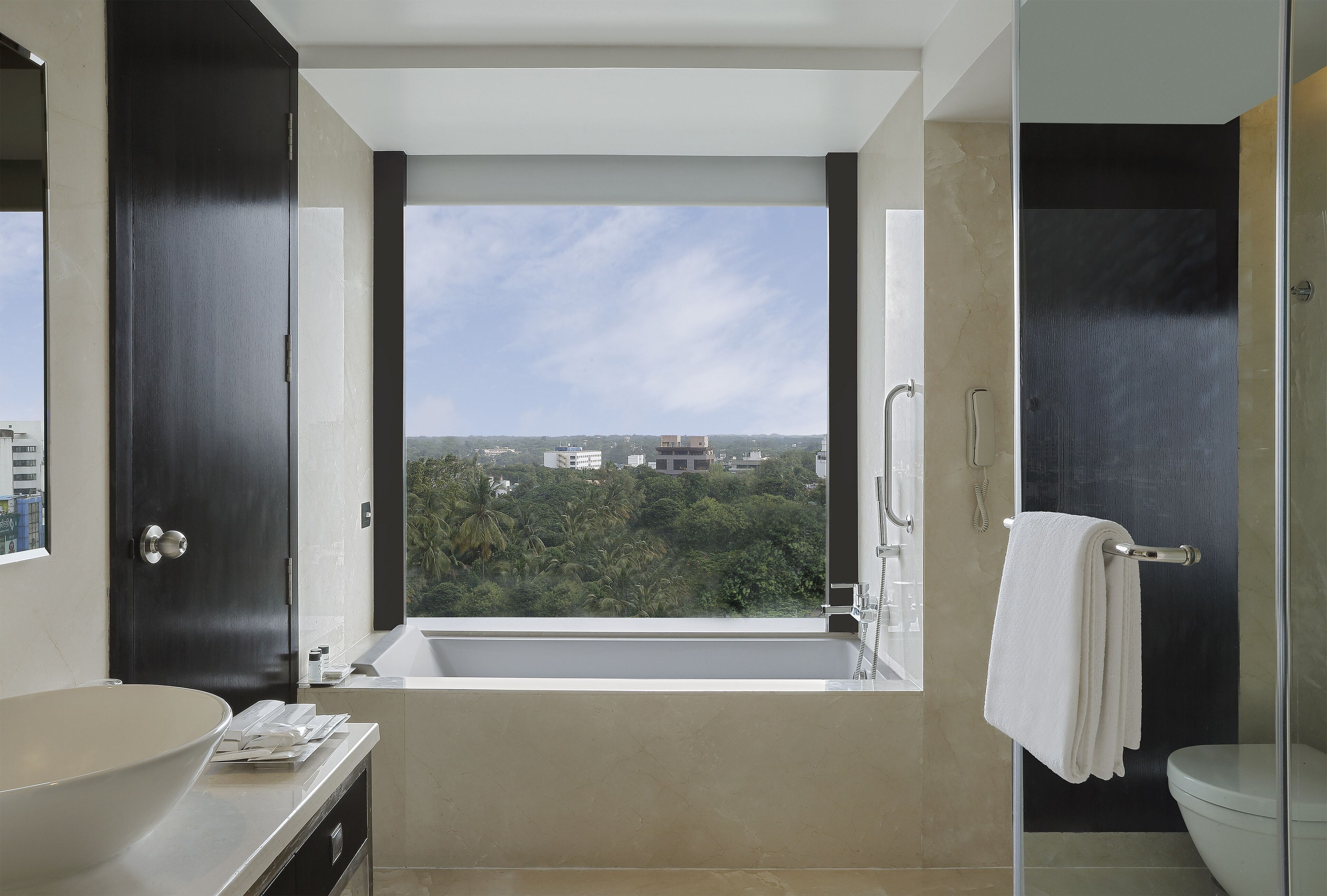 separate bathtub and shower, deep-soaking bathtub, rainfall showerhead