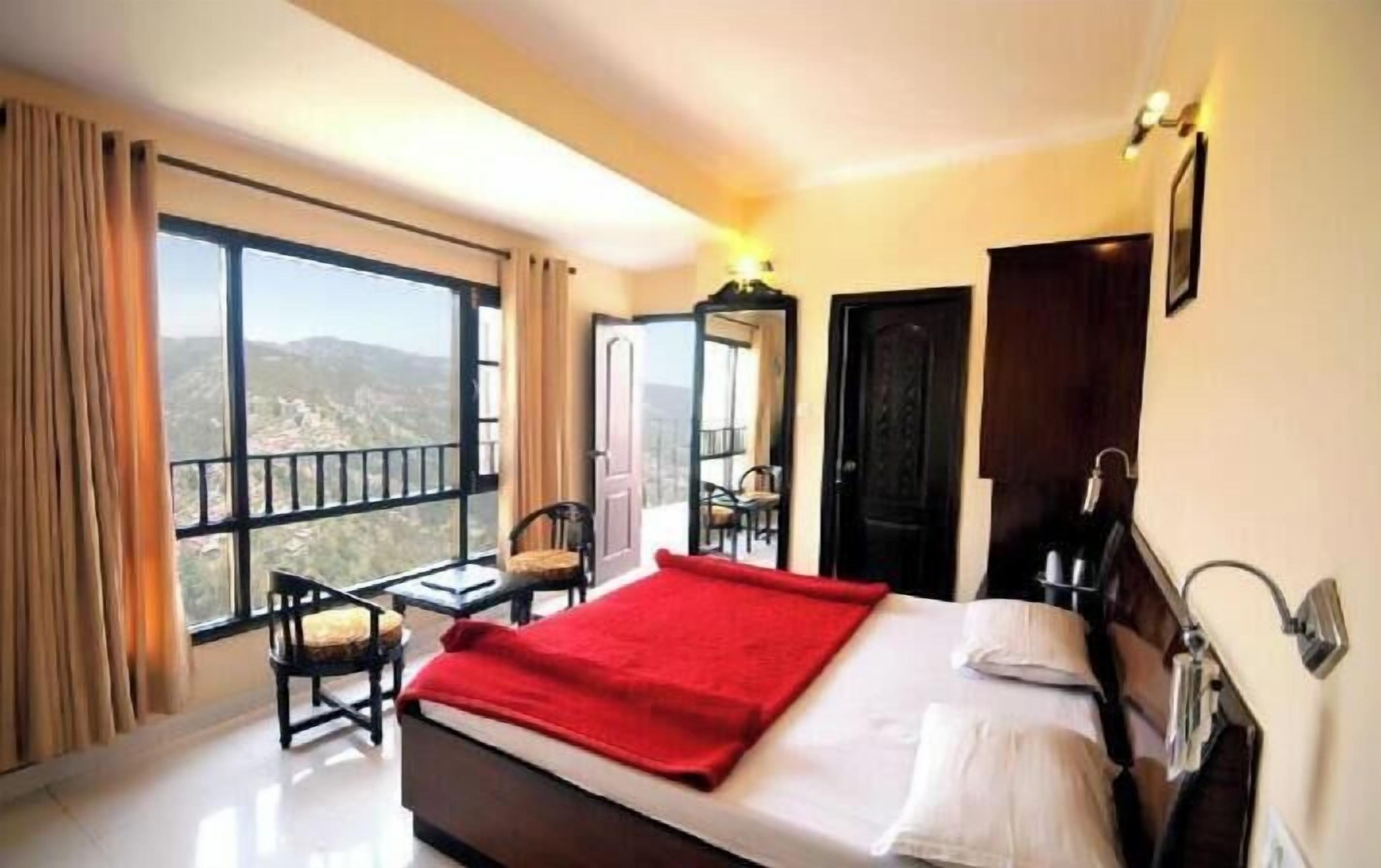 Premium bedding, desk, laptop workspace, blackout curtains