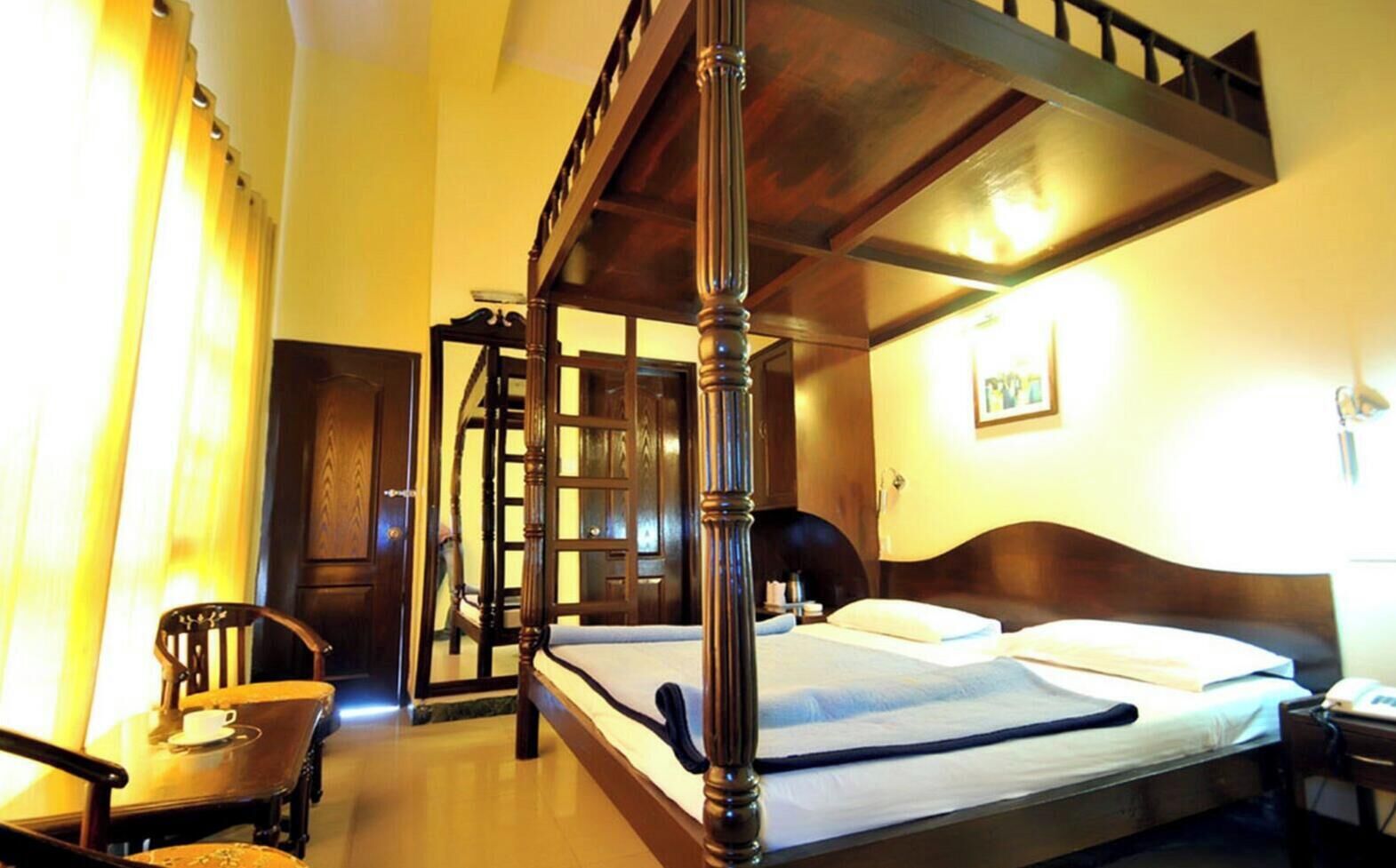 Premium bedding, desk, laptop workspace, blackout curtains