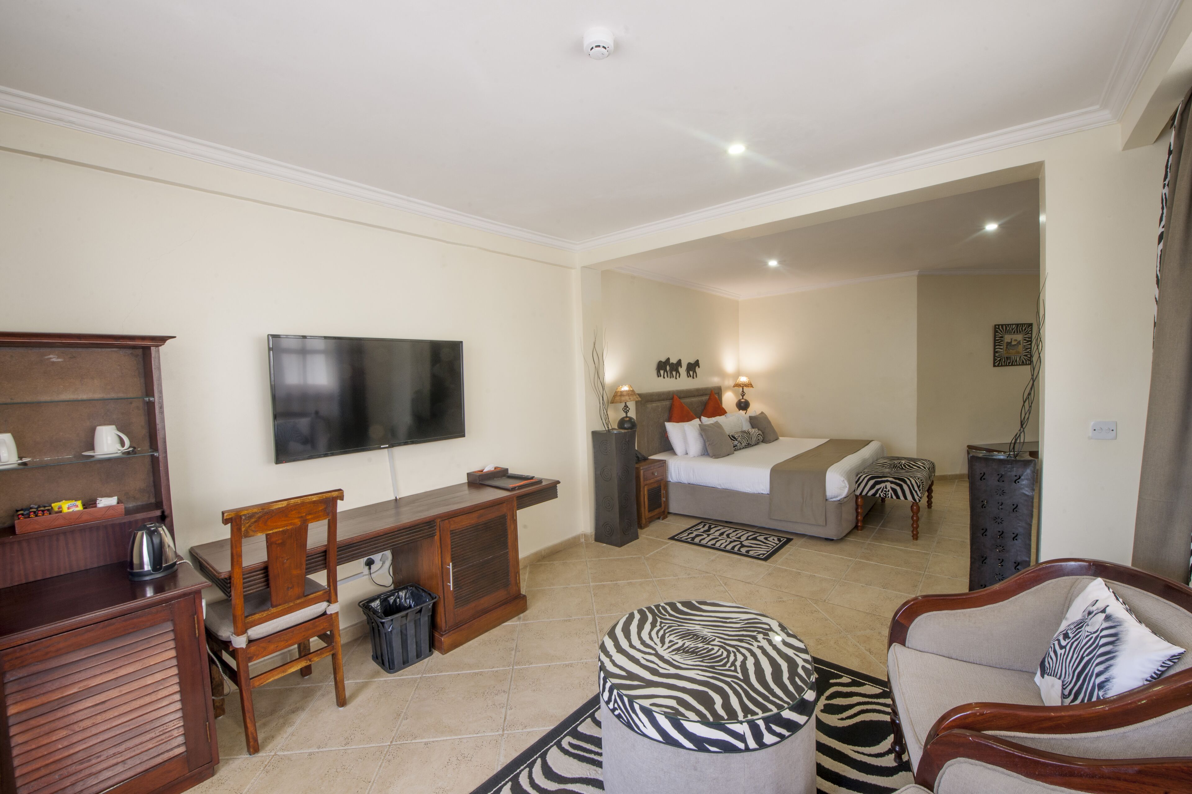 shower, designer toiletries, hair dryer, towels