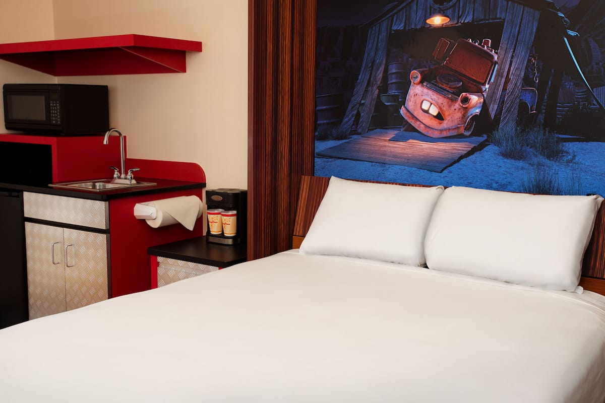 cars family suite | in-room safe, desk, laptop workspace, blackout curtains