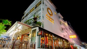 A multi-story hotel with a prominent "Asprey" sign on the facade, indicating a high-end dining establishment. - Aspery Hotel (Patong)
