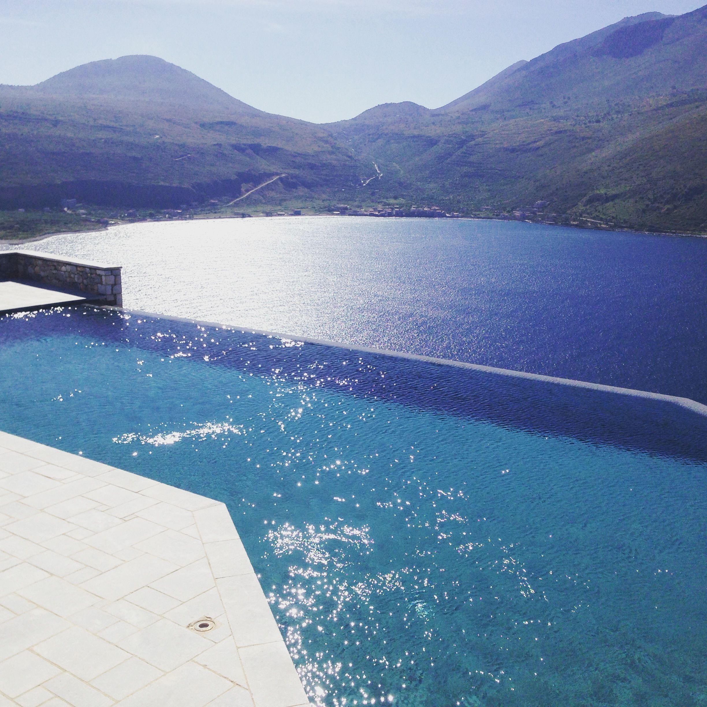 outdoor pool, open 10:00 am to 8:00 pm, pool umbrellas, pool loungers