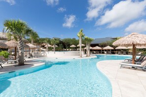 4 outdoor pools, free pool cabanas, pool umbrellas