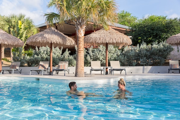 4 outdoor pools, free pool cabanas, pool umbrellas