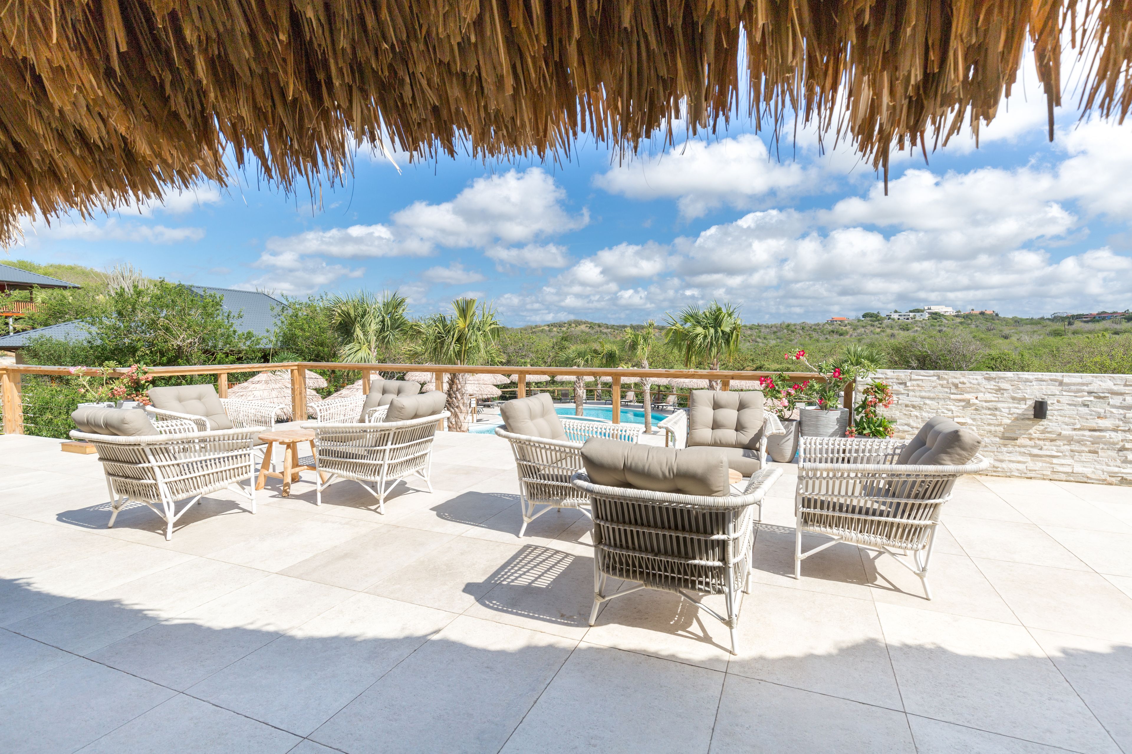 Breakfast, lunch, dinner served; international cuisine, pool views 