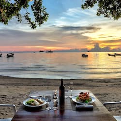 Breakfast, lunch, dinner served; beach views