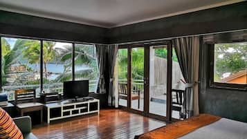 Deluxe Room, Pool View | In-room safe, individually furnished, free WiFi, bed sheets