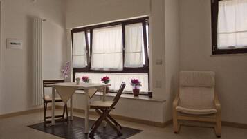 Classic Quadruple Room, Private Bathroom | In-room dining