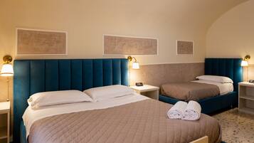Standard Triple Room, City View | Minibar, in-room safe, individually furnished, desk