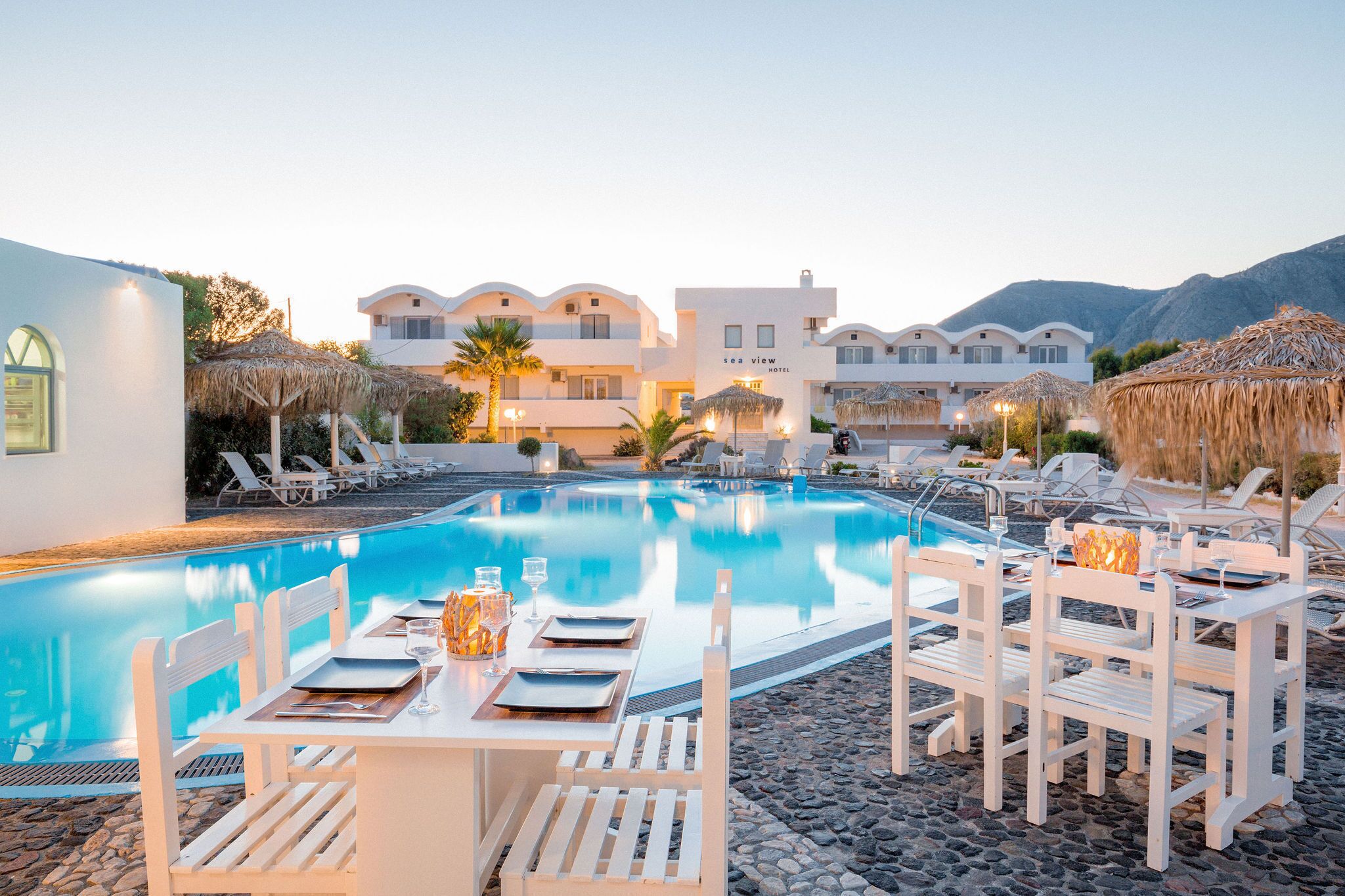 outdoor pool, pool umbrellas, pool loungers