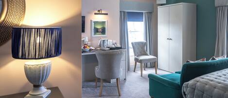 Une chambre d’hôtel équipée d’un bureau, d’une chaise, d’une armoire et d’un lit.