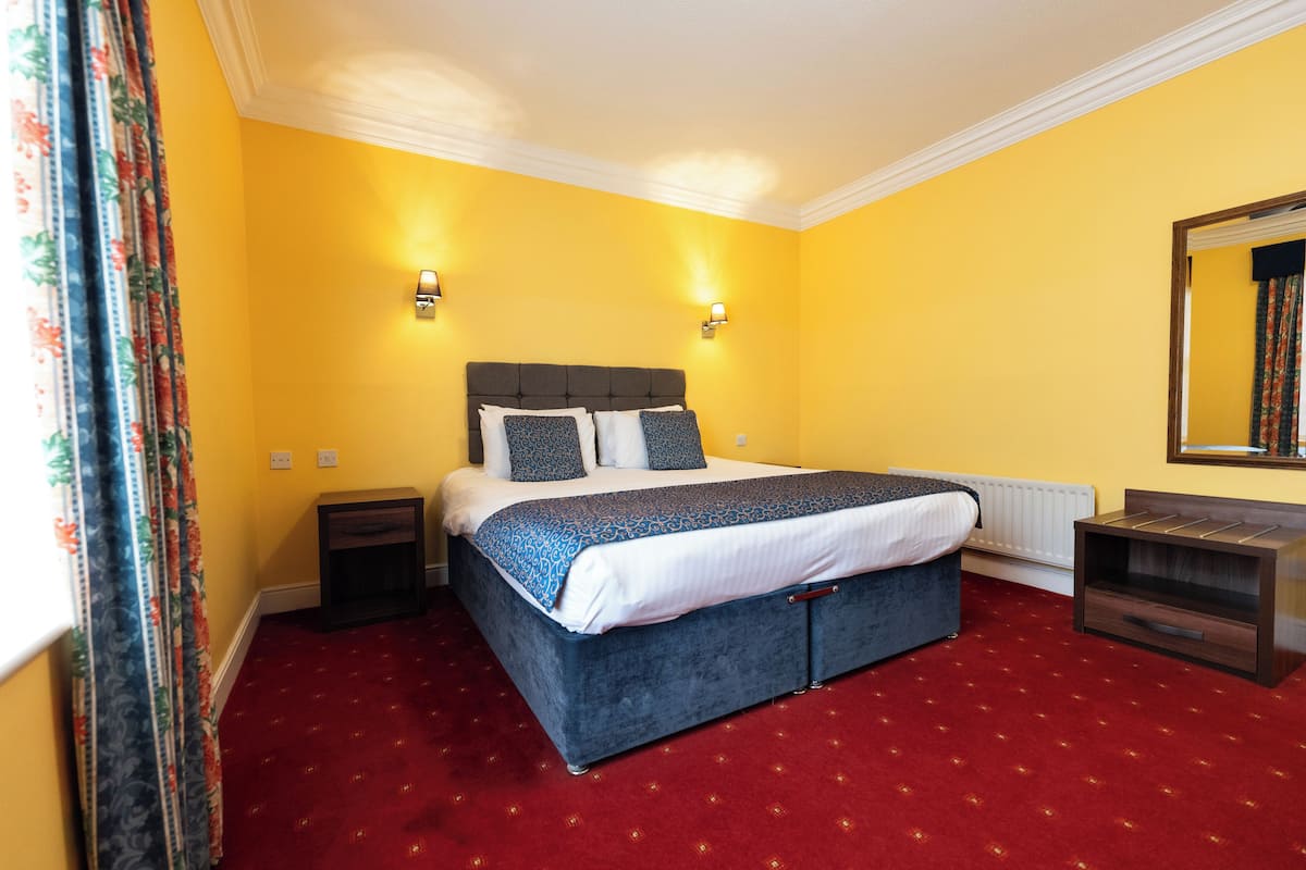 Standaard kamer, 1 kingsize bed | Een bureau, een laptopwerkplek, gratis wifi, beddengoed