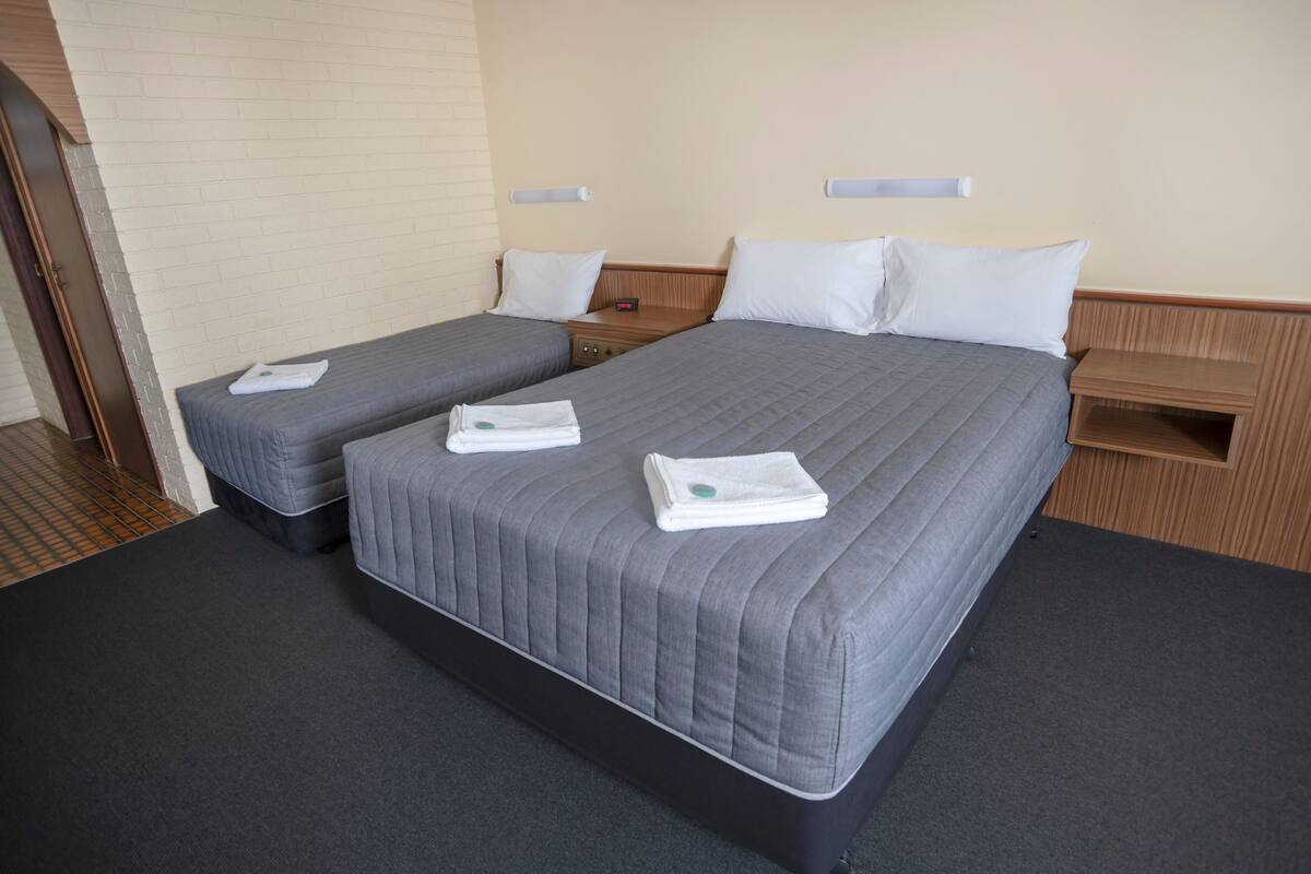 Laptop workspace, free WiFi, bed sheets