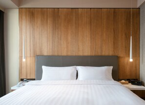 Premium bedding, down comforters, minibar, in-room safe