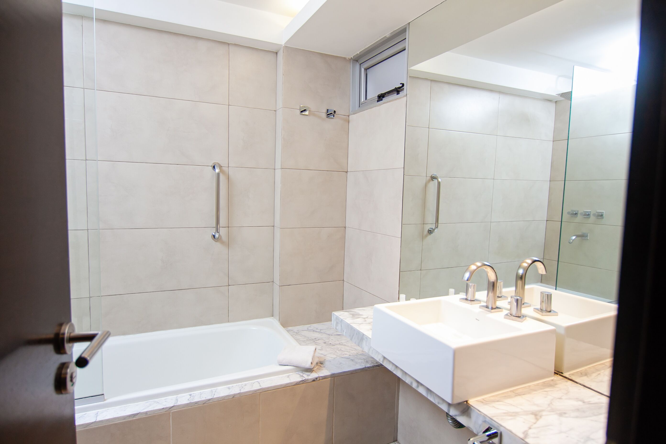 bathtub, hair dryer, towels