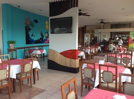 Breakfast, lunch, dinner served; international cuisine, ocean views 