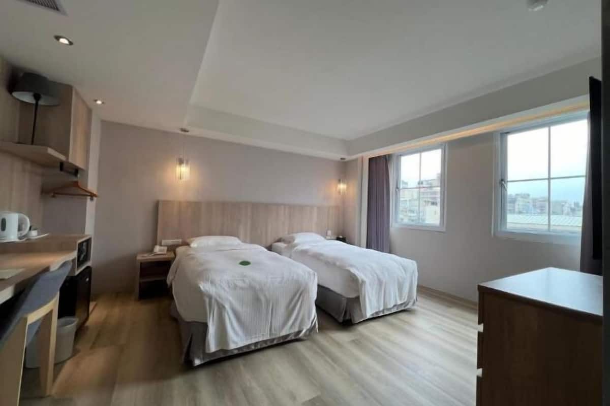 Premium bedding, down comforters, pillowtop beds, minibar