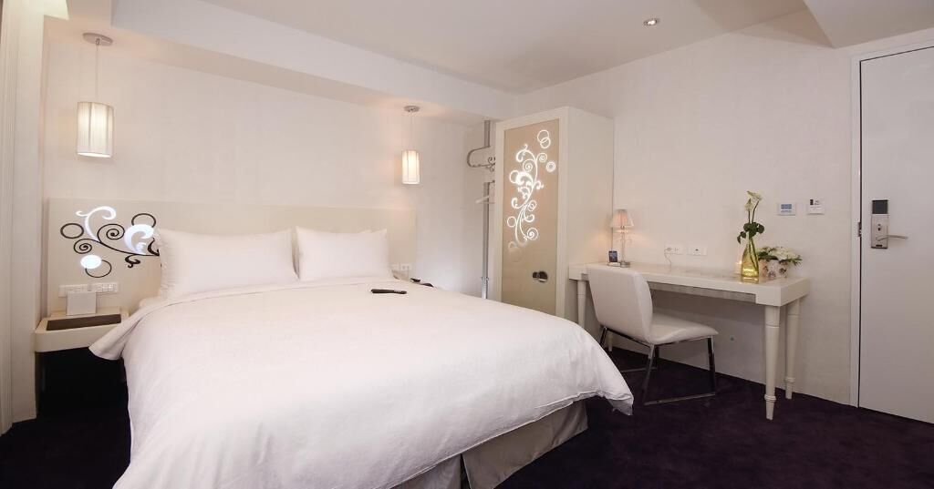 Premium bedding, down comforters, pillowtop beds, minibar